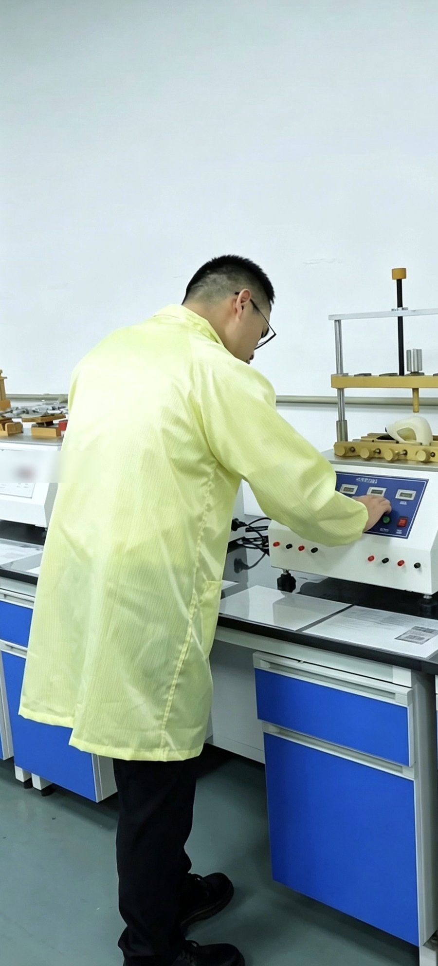 Quality control engineer running product tests in our lab